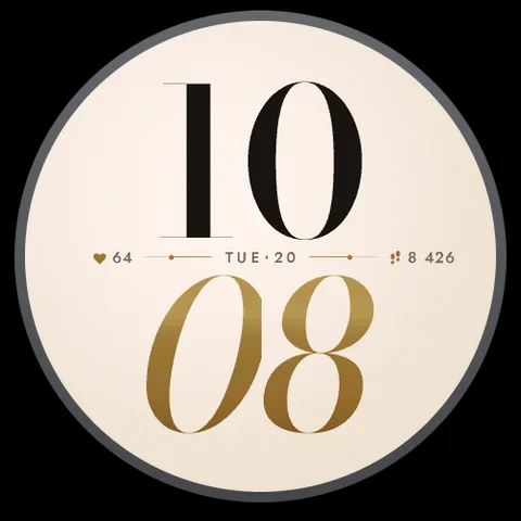 Astra Couture watch face for Garmin. Two large stacked Didone numerals, roman hours and gilded italic minutes, with a fine gold thread that carries the date.