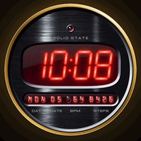 Astra Diode watch face for Garmin. Four red 7-segment LED digits behind a ruby window on a brushed gold dial, with a row of calculator bubble lenses.