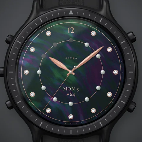 Astra Pearl watch face for Garmin. Iridescent mother of pearl, eleven set diamonds and a row of twelve pearls that follows your Body Battery, with a band of light gliding across the nacre at every wrist raise.
